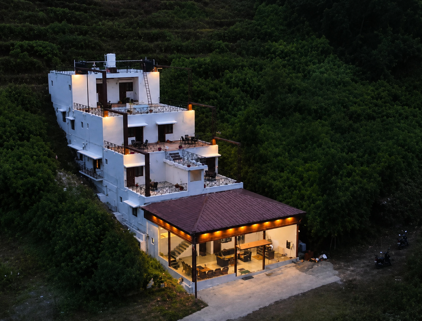 Kodai Sims Grand exterior surrounded by greenery
